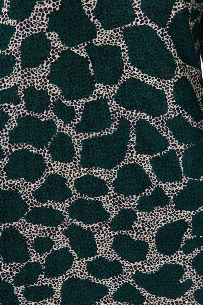 Maslin Knit Dress In Green With Grey Print - fabric