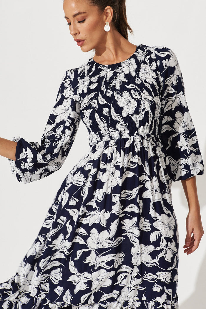 Noosa Midi Dress In Navy With White Floral - front