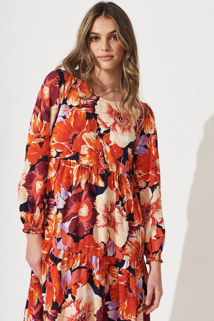 Yena Midi Dress In Navy With Rust Floral - Front