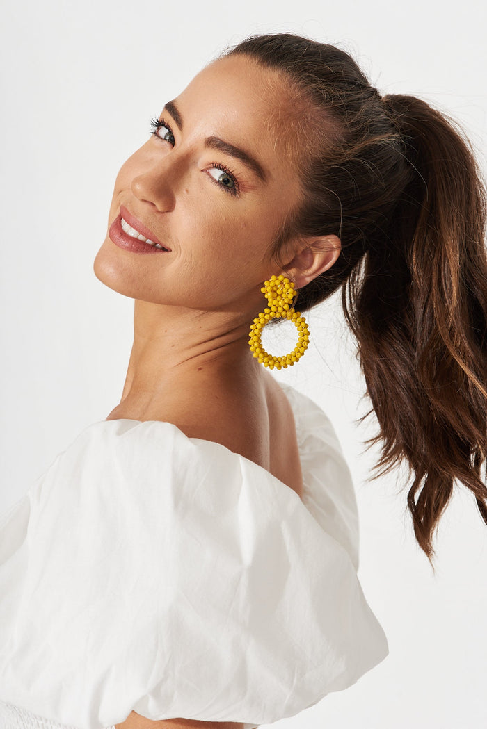 August + Delilah Poarch Bead Earrings In Mustard - side