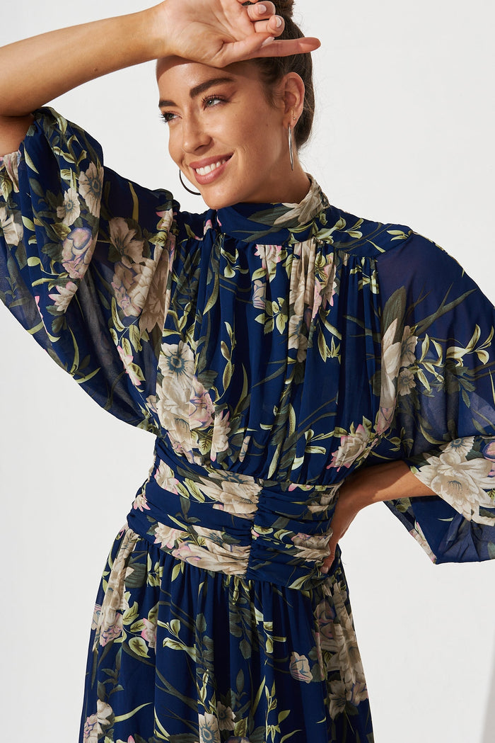 Rosamund Maxi Dress In Navy With Beige Floral Chiffon - front detail