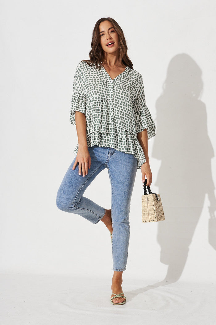 Relia Top In White With Green Polka Dot - full length