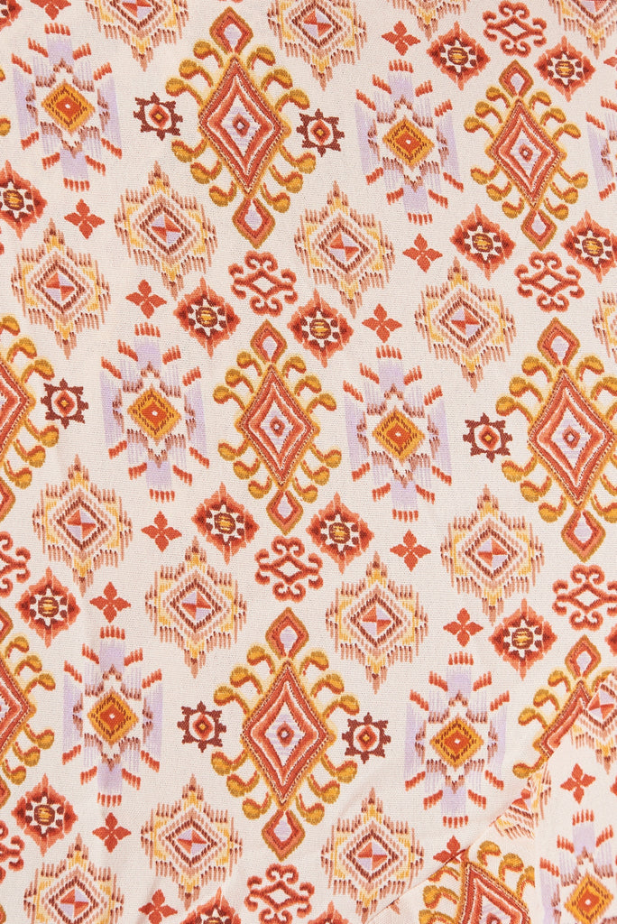 Felicidad Midi Wrap Dress In White With Rust Aztec - fabric
