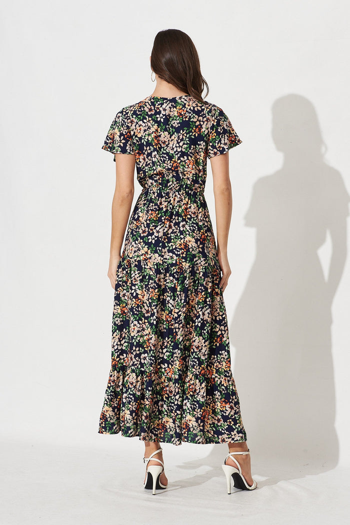 Elxi Maxi Dress In Navy With Beige Floral - back