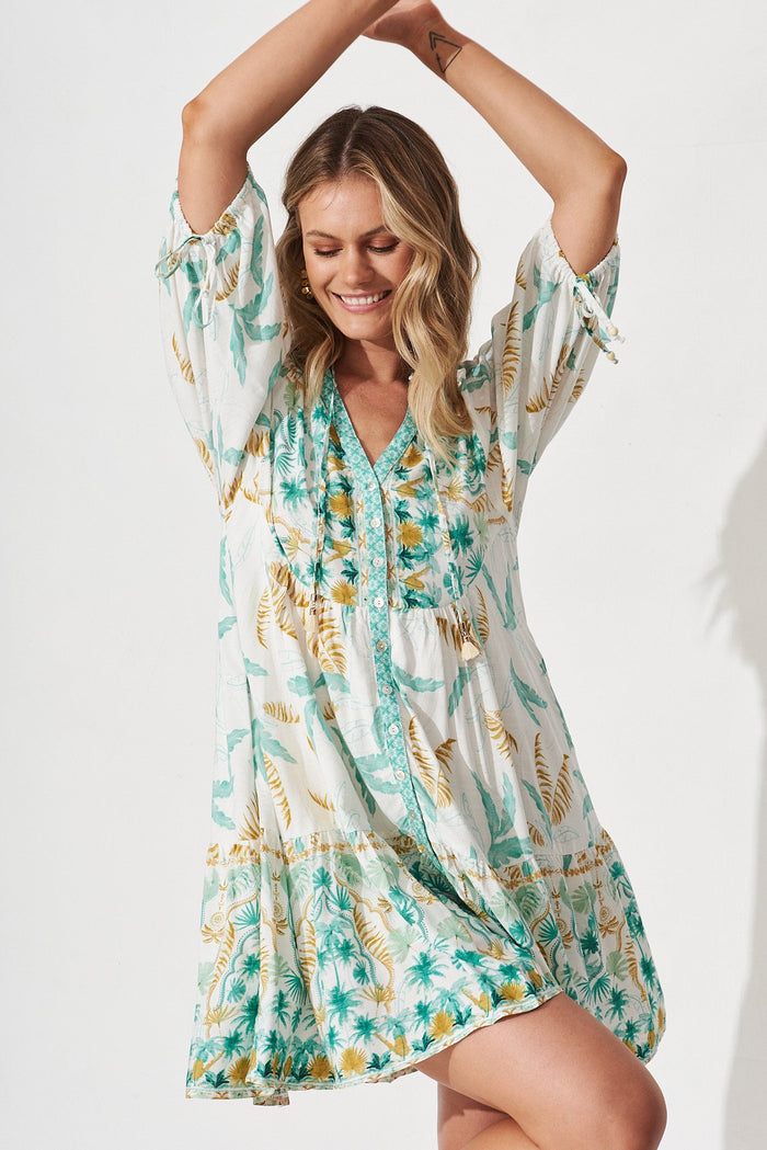 Aine Dress In White With Green Tropical Leaf - front