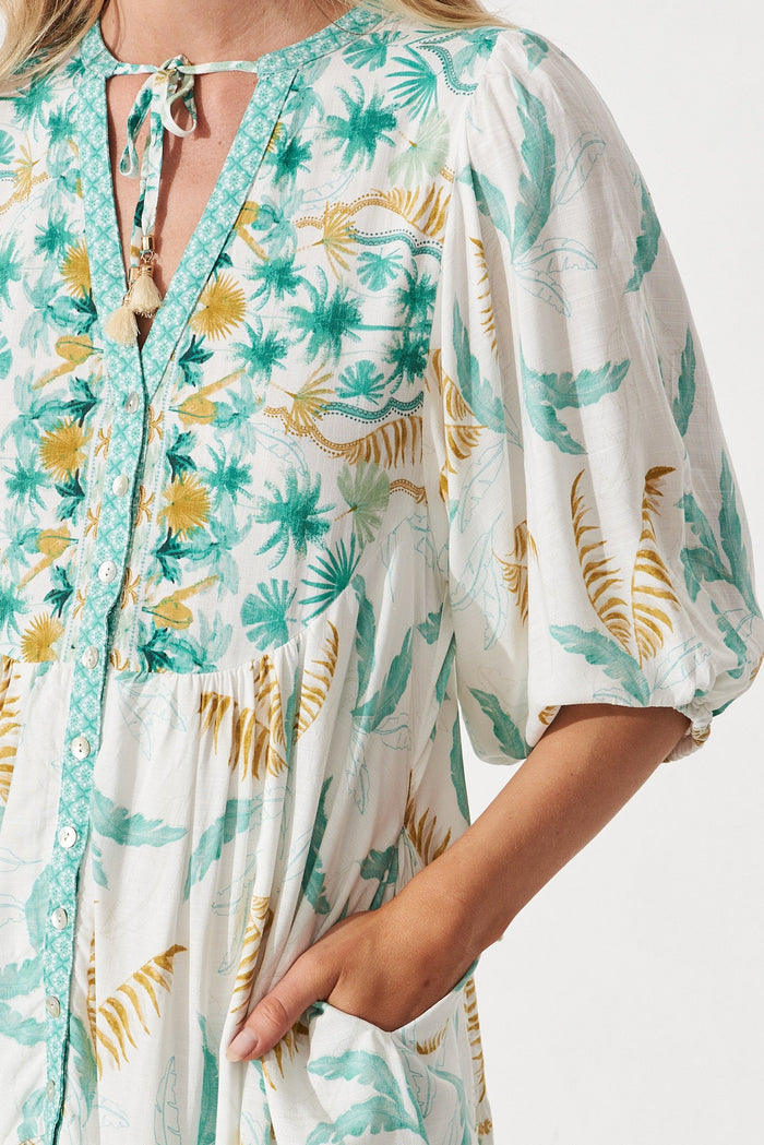 Aine Dress In White With Green Tropical Leaf -  detail