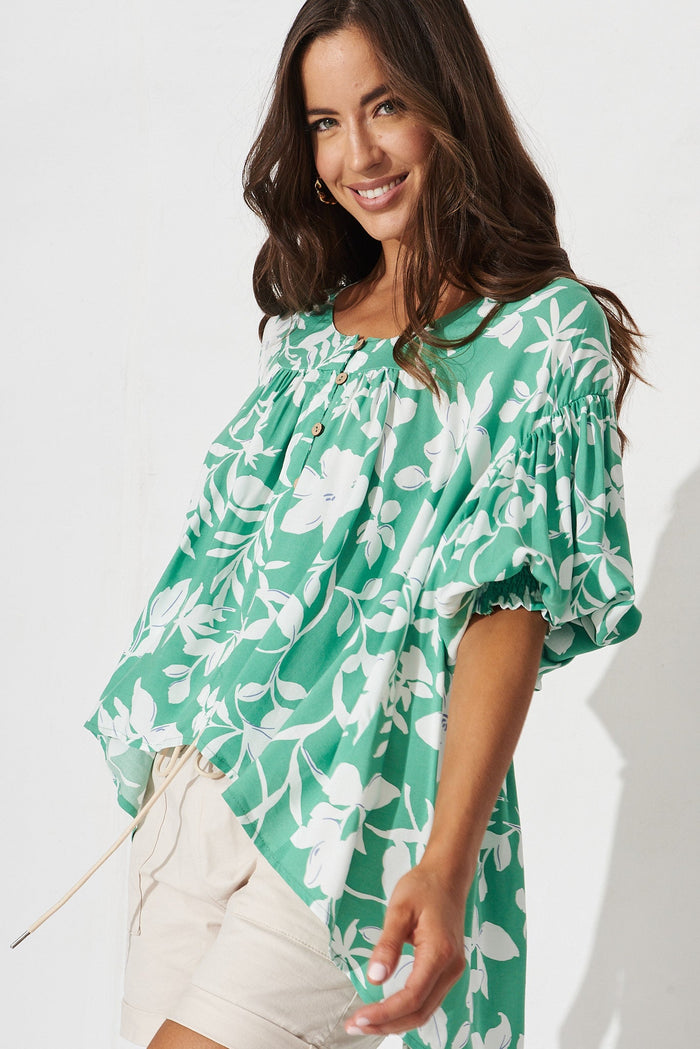 Hilee Top In White With Green Floral - front