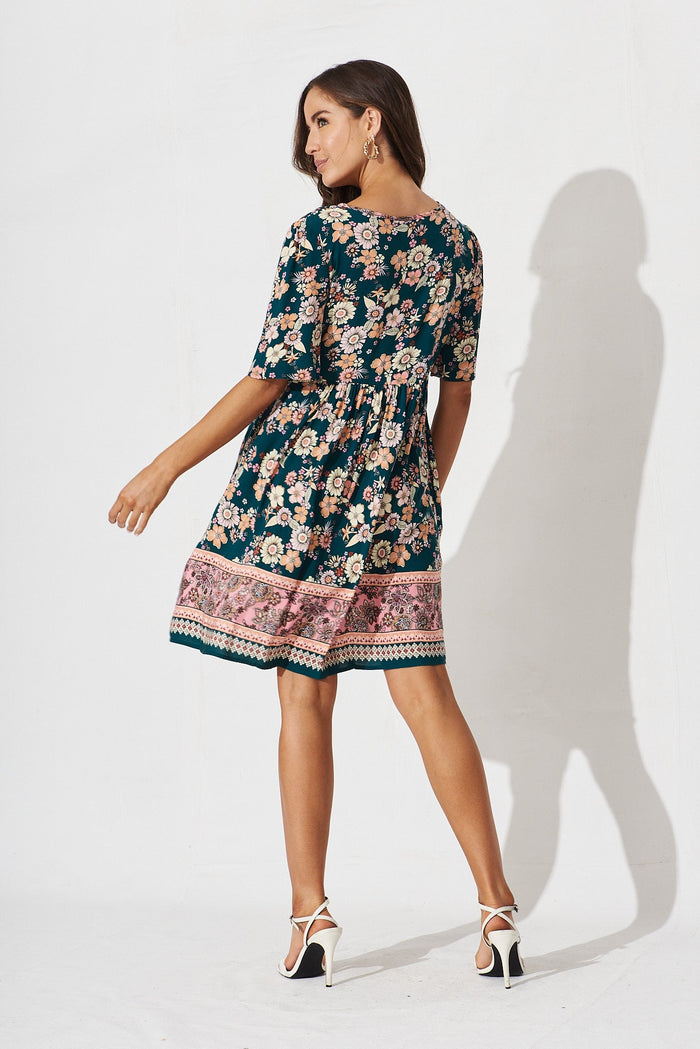 Shake It Out Dress In Teal With Orange Boho Print - back