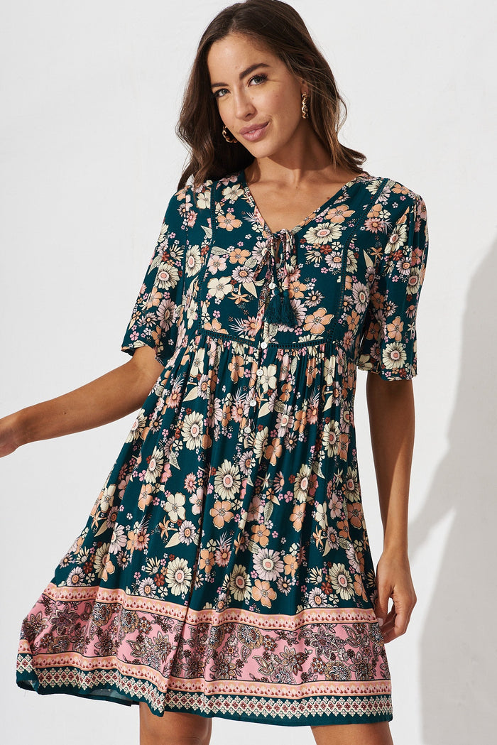Shake It Out Dress In Teal With Orange Boho Print - front