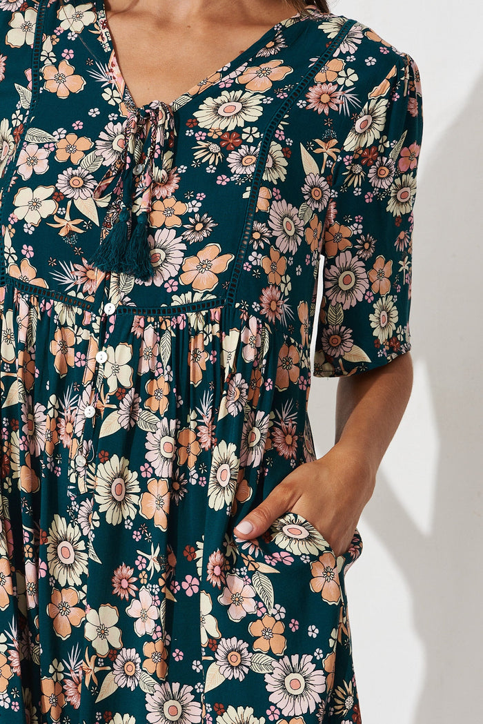 Shake It Out Dress In Teal With Orange Boho Print - detail