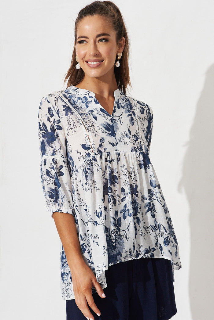 Ommina Top In White With Navy Floral - front