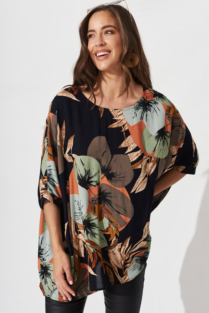 Jollee Top In Black With Multi Leaf Print - front