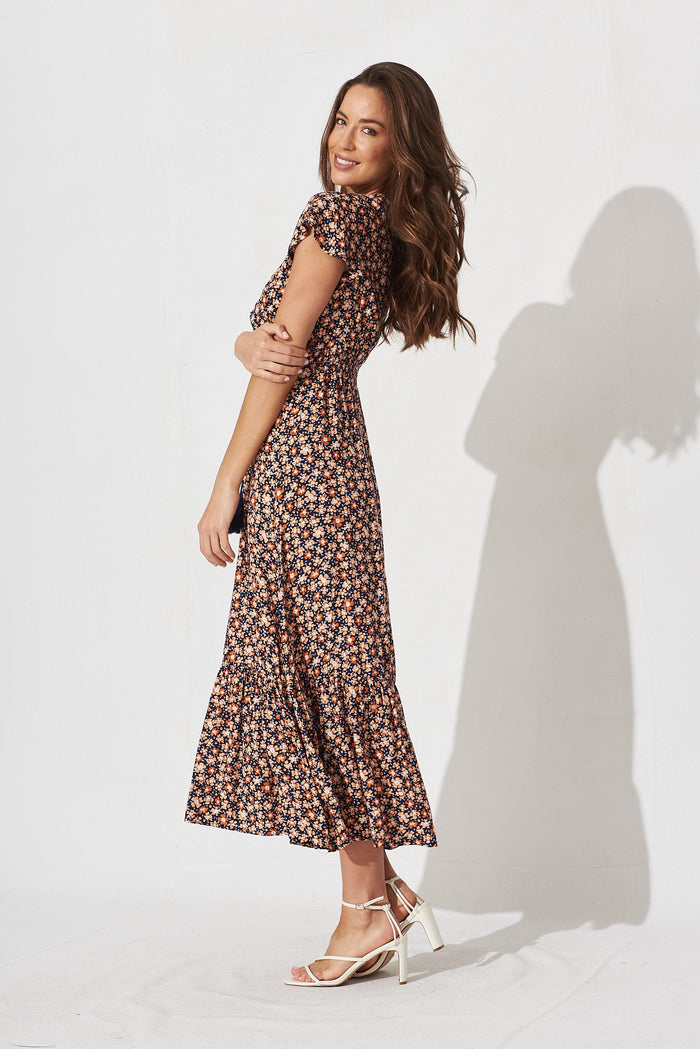 Raelynn Maxi Dress In Navy With Orange Ditsy Floral - side