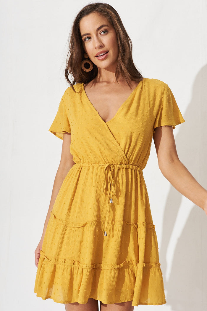Pisces Dress In Mustard Swiss Dot - front