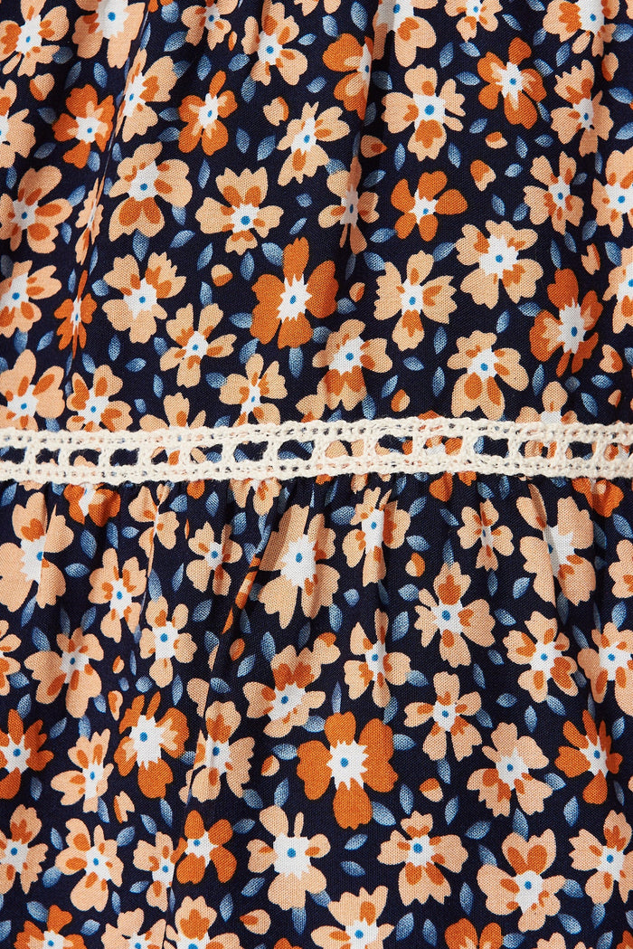 Costa Skirt In Navy With Orange Ditsy Floral - fabric