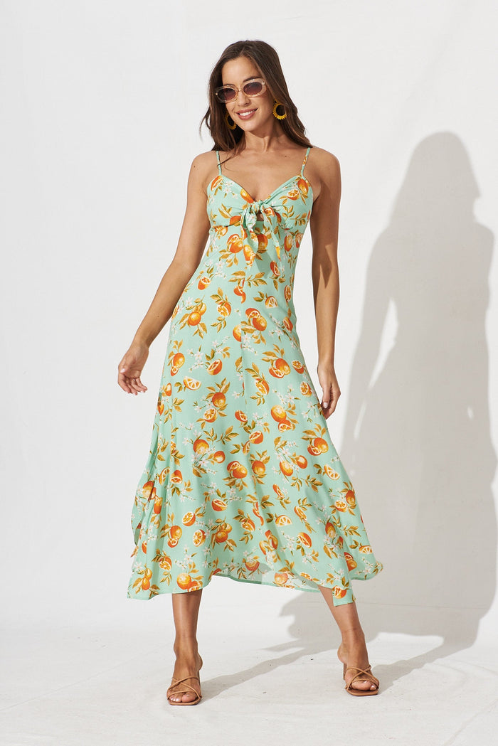 Dana Midi Sun Dress In Green With Orange Print - full length