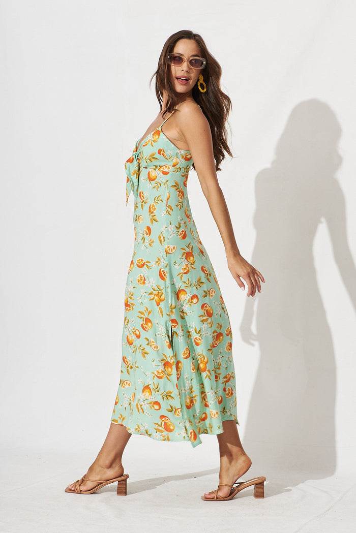 Dana Midi Sun Dress In Green With Orange Print - side