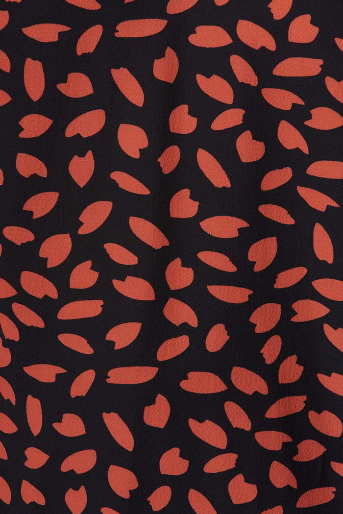 Trinity Top In Black With Rust Leaf - fabric