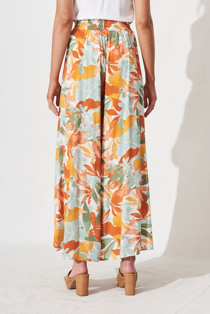 Mariah Pants In White With Orange Leaf Print - back