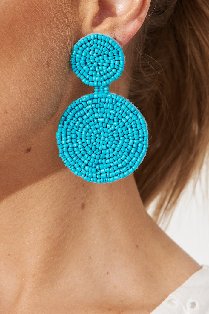 August + Delilah Violet Earring In Turquoise - close up