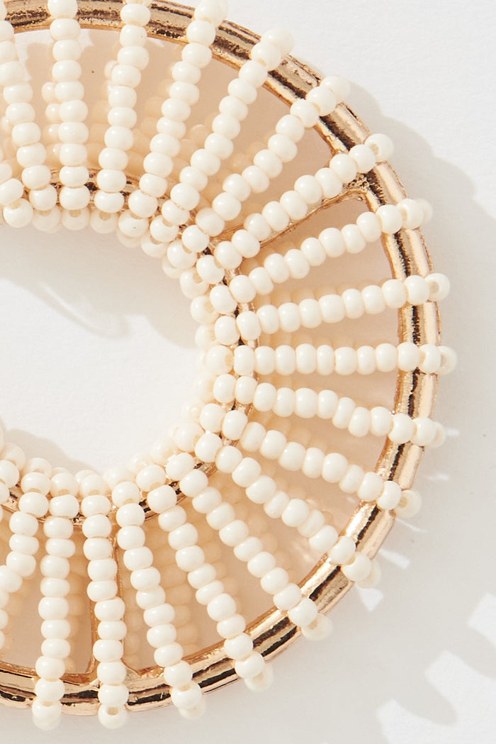 August + Delilah Nyda Hoop Earrings In Cream - detail close up