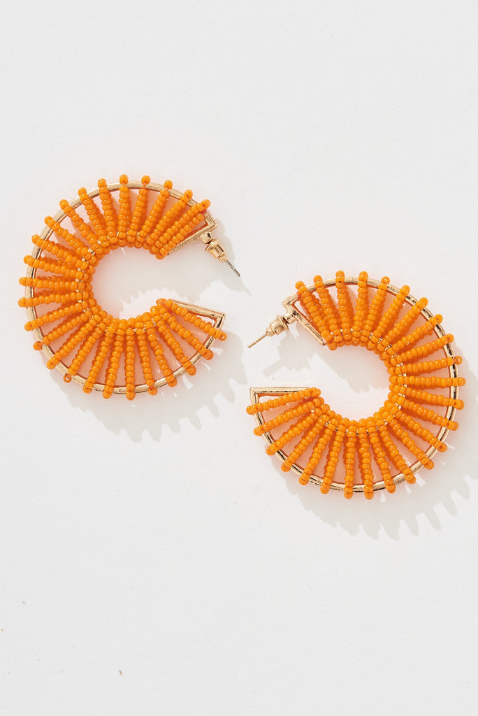 August + Delilah Nyda Hoop Earrings In Orange - front
