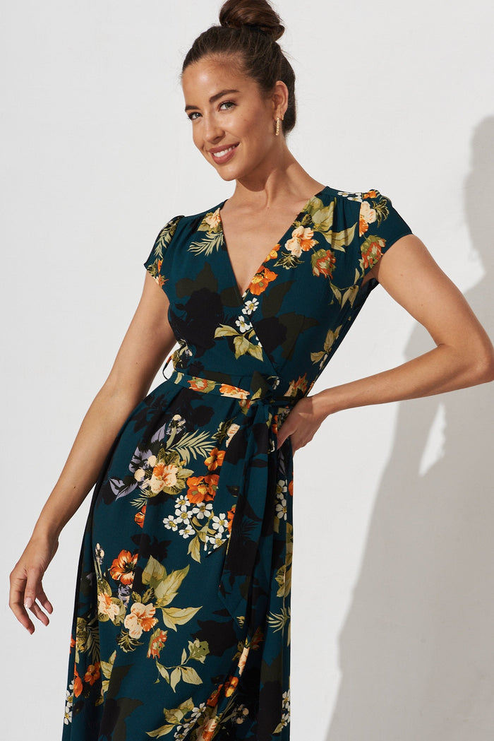 Krissy Mock Wrap Dress In Green With Apricot Floral - front