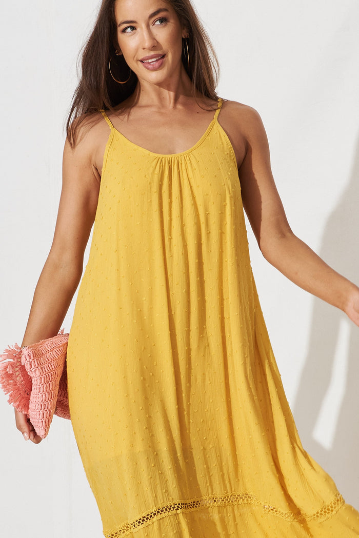 Lost Paradise Maxi Dress In Mustard Swiss Dot - front