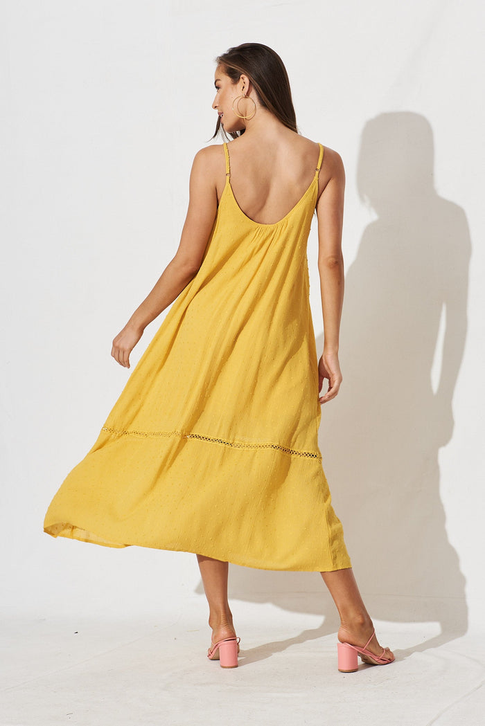 Lost Paradise Maxi Dress In Mustard Swiss Dot - back