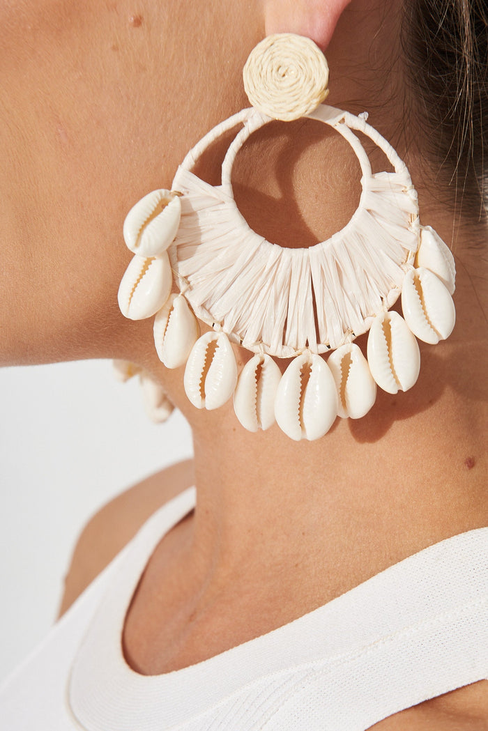 August + Delilah Sealand Drop Earrings In Cream Straw With Shells - side close up