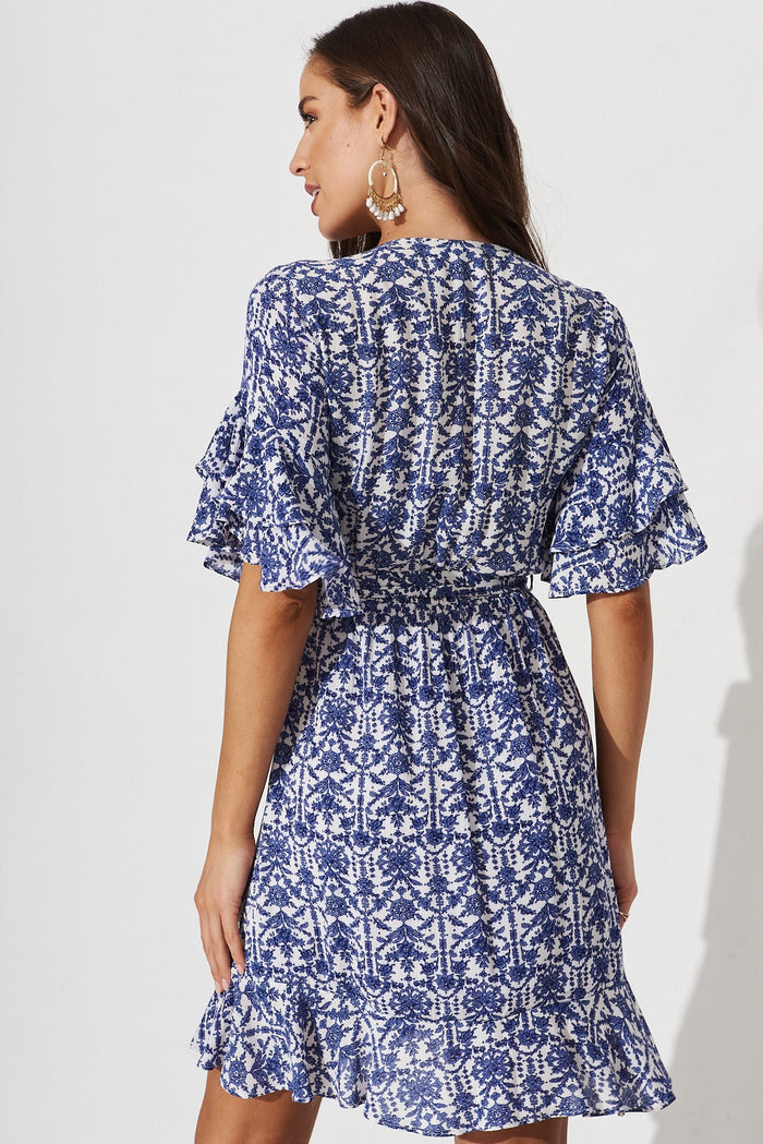 Keeyen Wrap Dress In White With Blue Floral - back