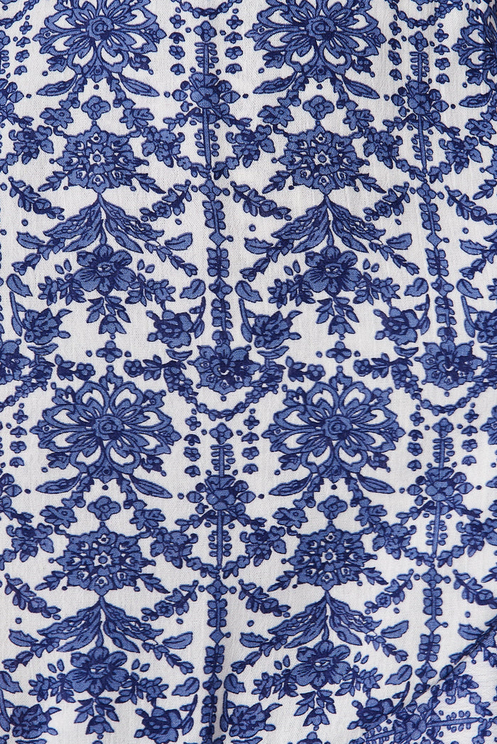 Keeyen Wrap Dress In White With Blue Floral - fabric