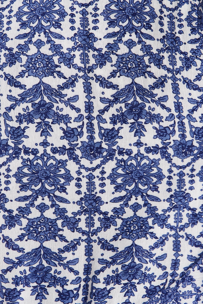 Keeyen Wrap Dress In White With Blue Floral - fabric