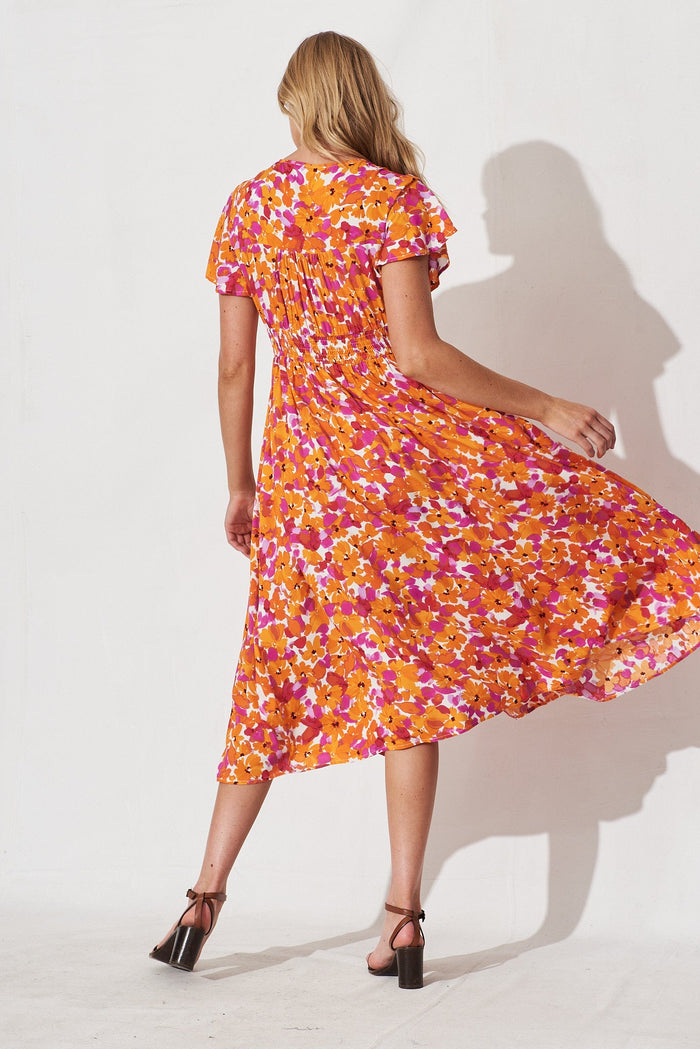 Nikke Midi Dress In White With Rust Purple Floral - back