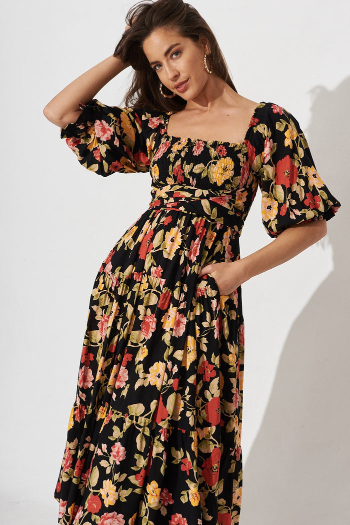 Tiare Midi Dress In Black With Red Floral - front