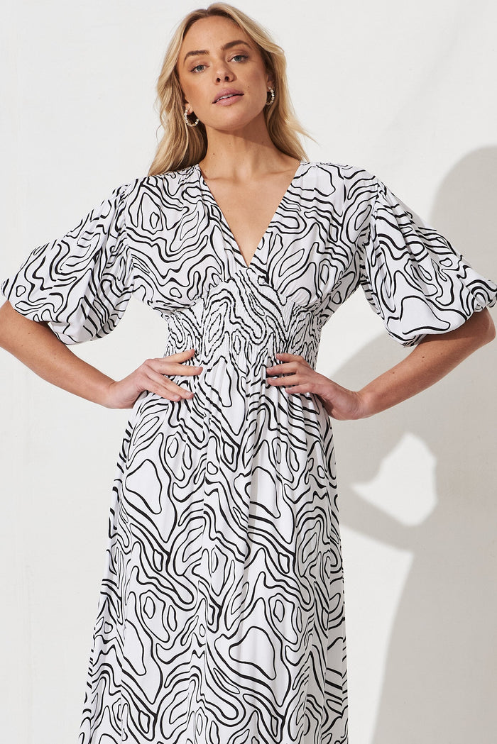 Jecci Midi Dress In White With Black Abstract Print - front
