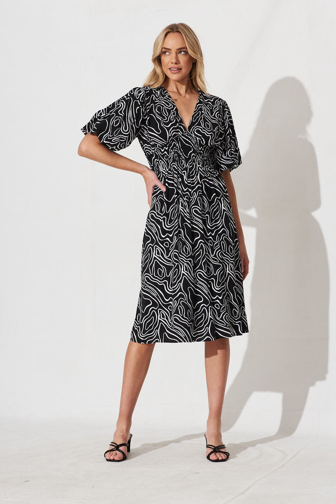Jecci Midi Dress In Black With White Abstract Print - full length