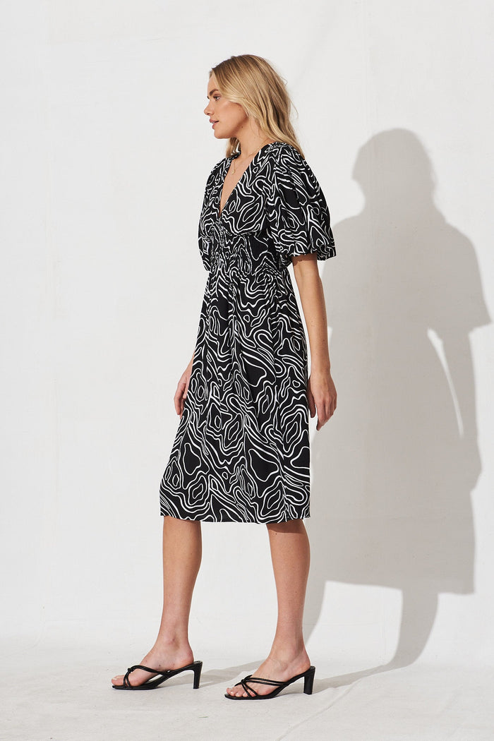 Jecci Midi Dress In Black With White Abstract Print - side
