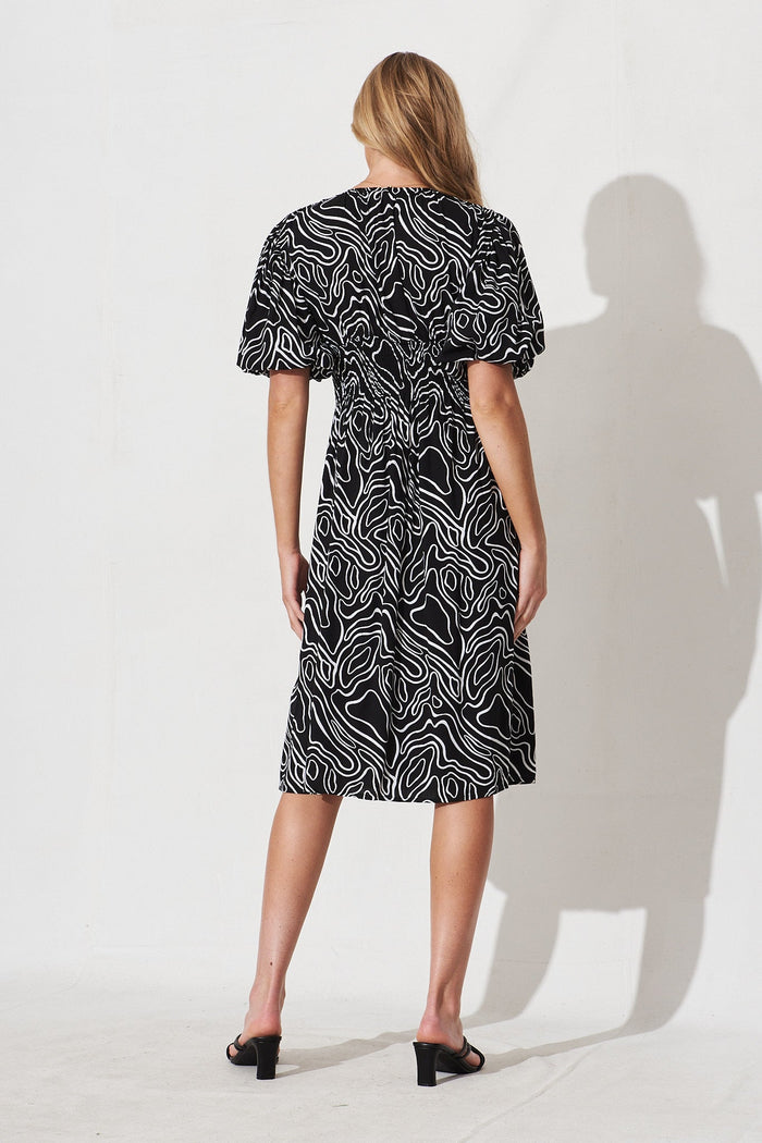 Jecci Midi Dress In Black With White Abstract Print - back