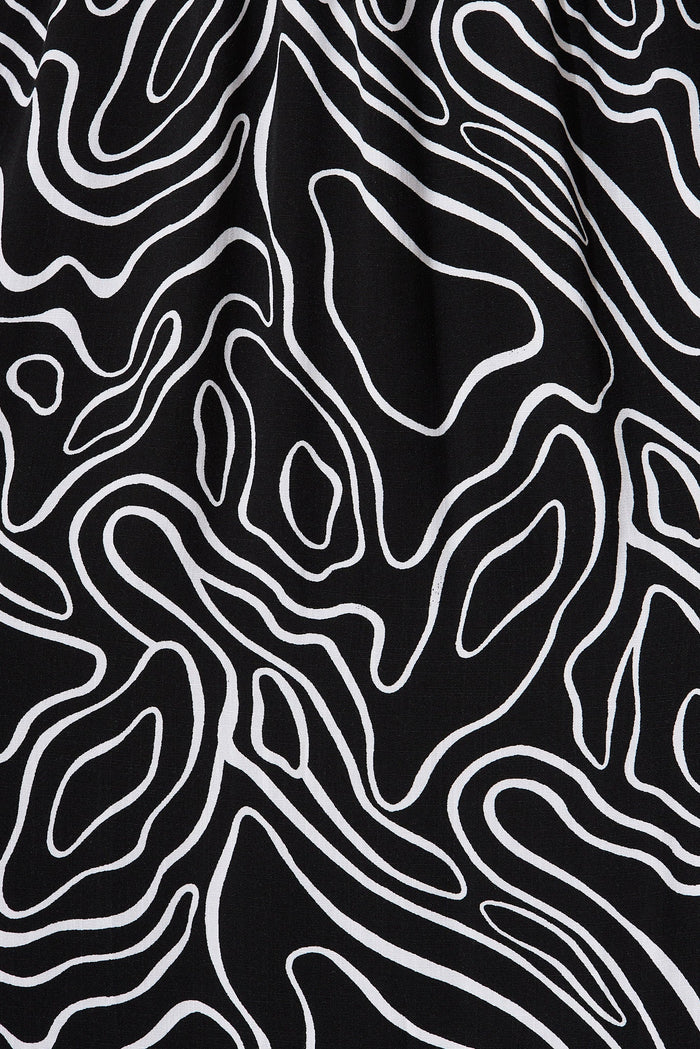 Jecci Midi Dress In Black With White Abstract Print - fabric
