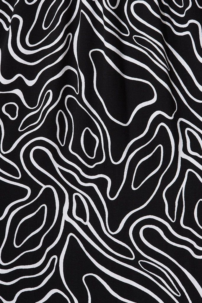 Jecci Midi Dress In Black With White Abstract Print - fabric