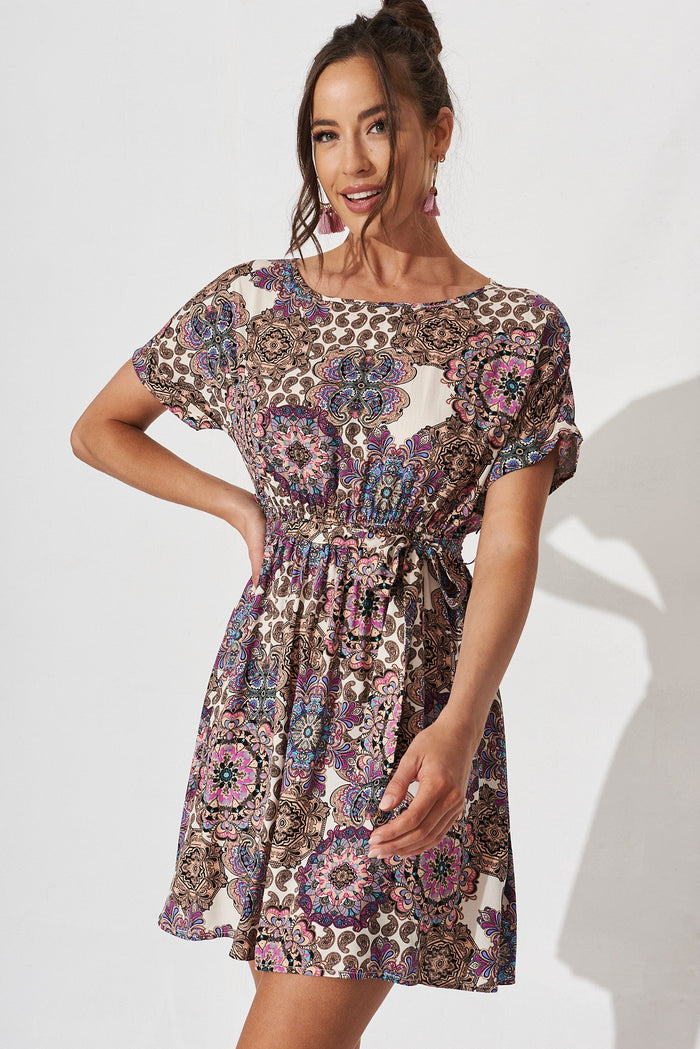 Lottie Dress In Cream With Purple Paisley - front