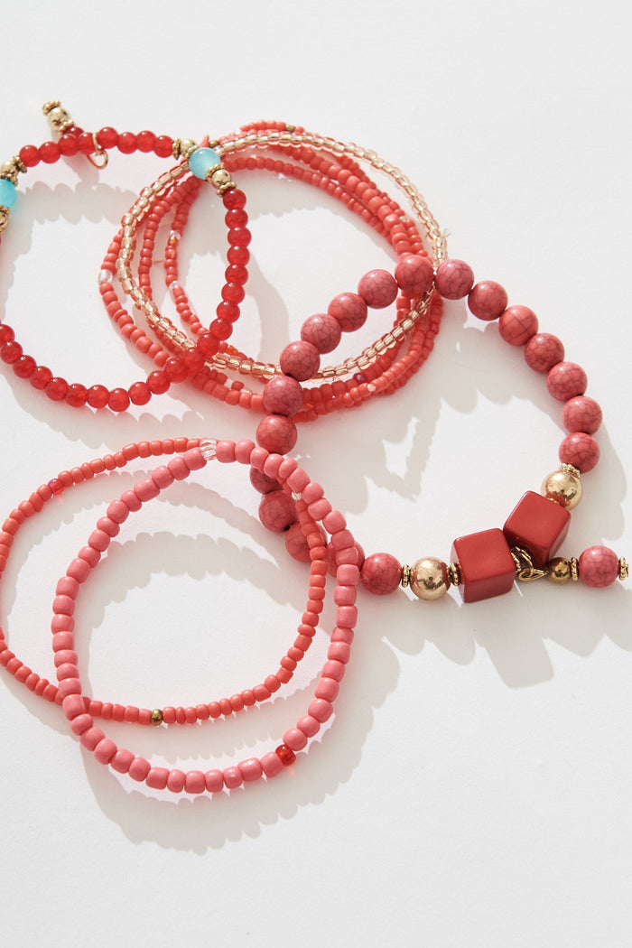 August + Delilah Heather Stacked Bracelet In Hot Pink - close up flatlay