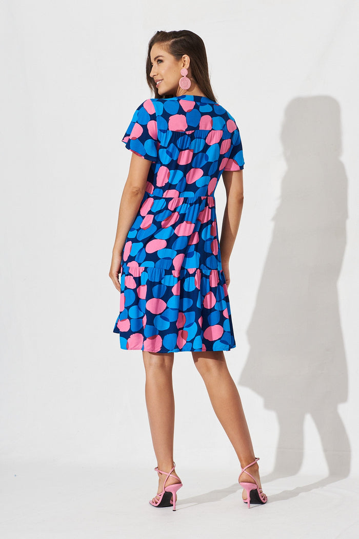 Shelby Smock Dress In Navy With Blue Spot - back