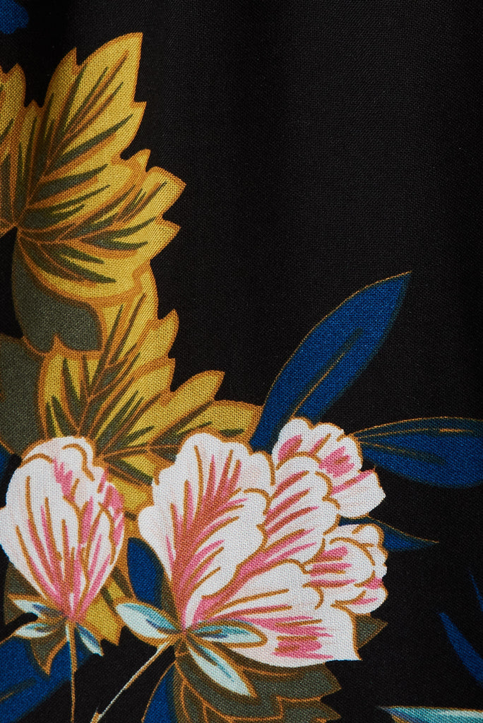Pescara Midi Dress In Black With Green Leaf - fabric