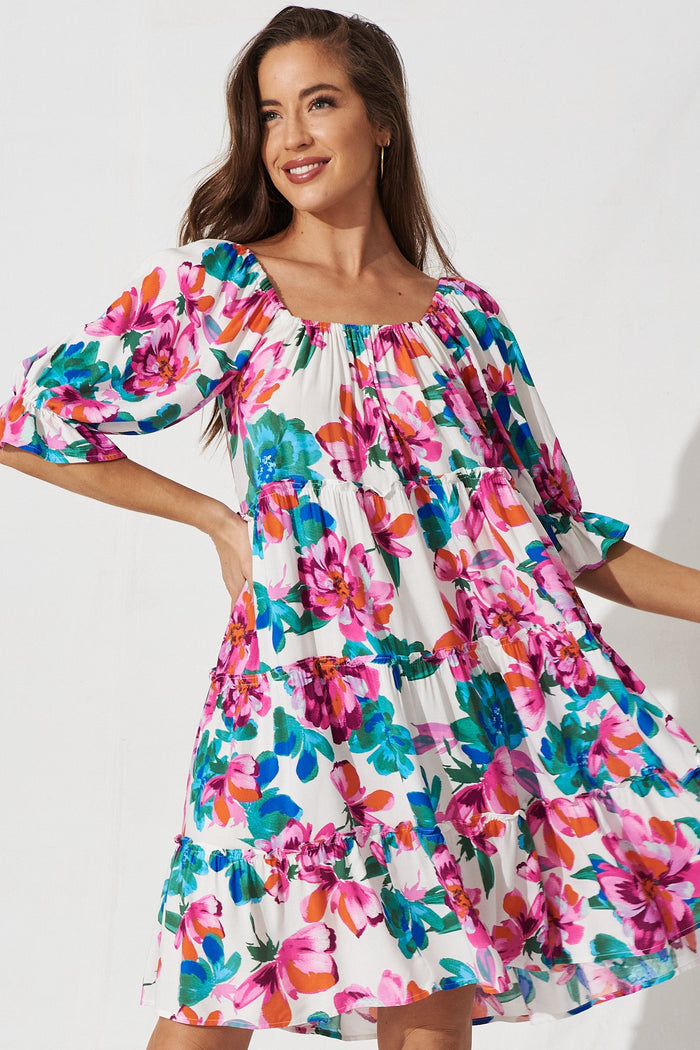 Grana Dress In White With Blue And Purple Floral - front