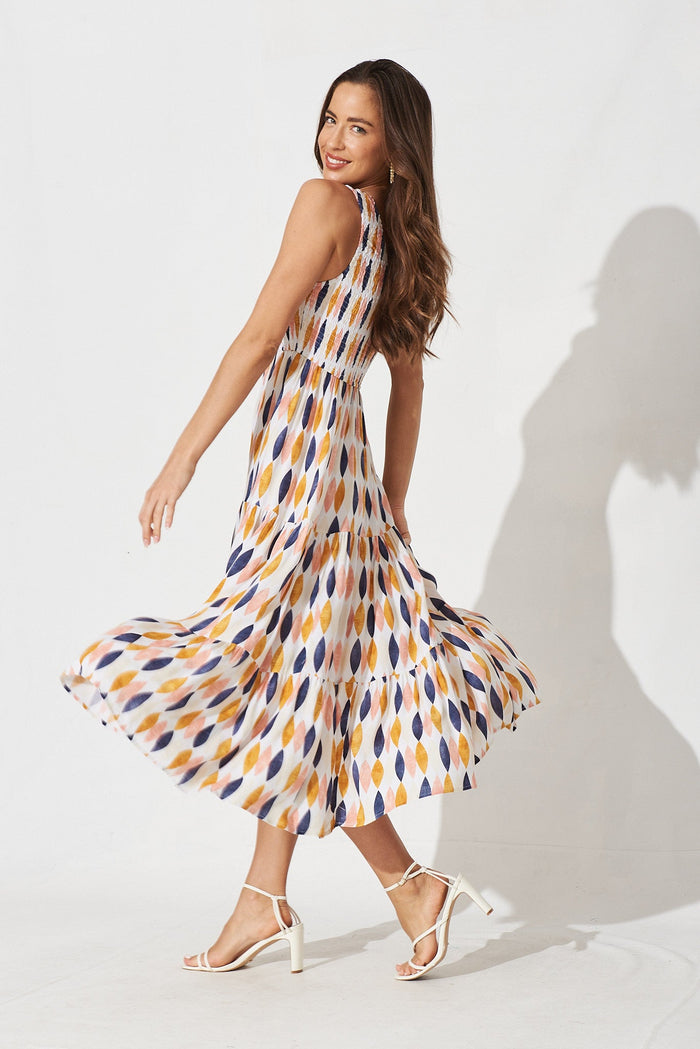 Hannary Midi Dress In White With Yellow And Navy Leaf Print - left side