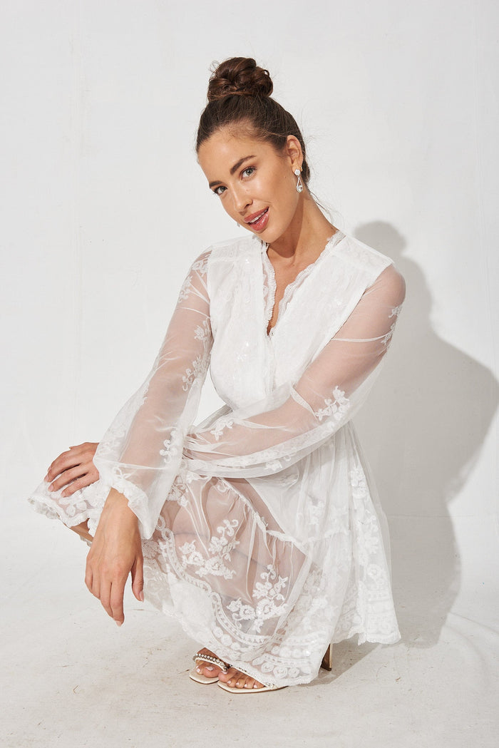 Iconic Sequin Dress In White - detail sitting