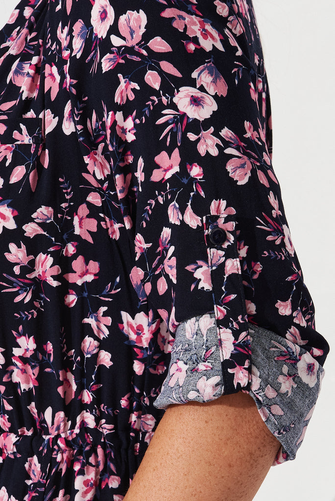 Rival Zip Dress In Navy With Pink Floral - detail roll tab