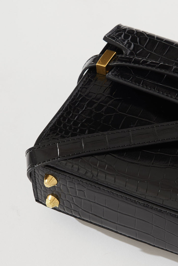 August + Delilah Glenory Sling Bag In Black Croc Pattern - detail